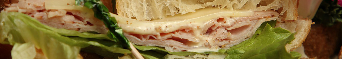 Eating Deli Sandwich at Submarina California Subs restaurant in Lancaster, CA.